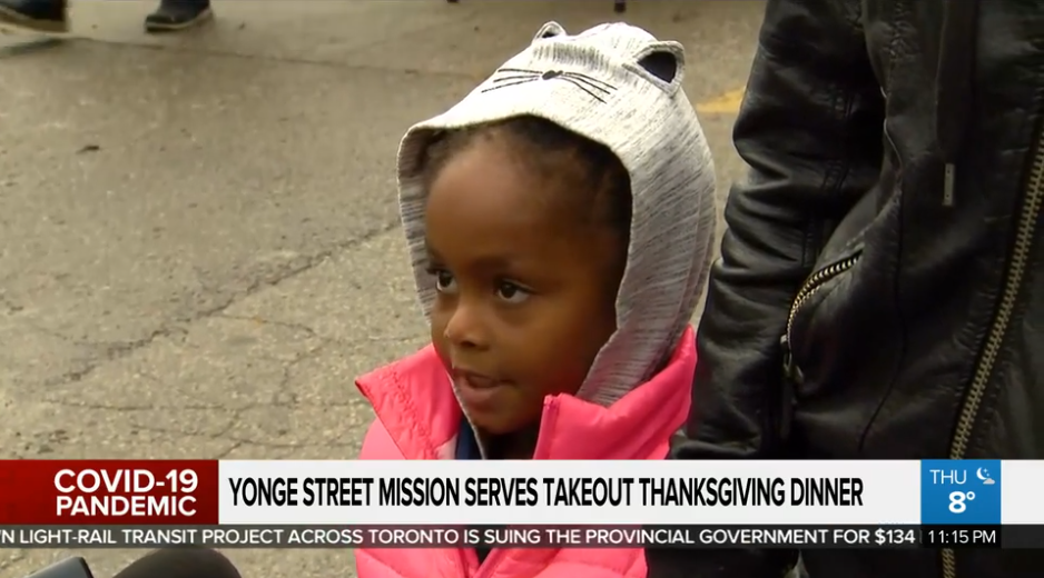 Child being interviewd on CityNews about YSM's Thanksgiving Meal