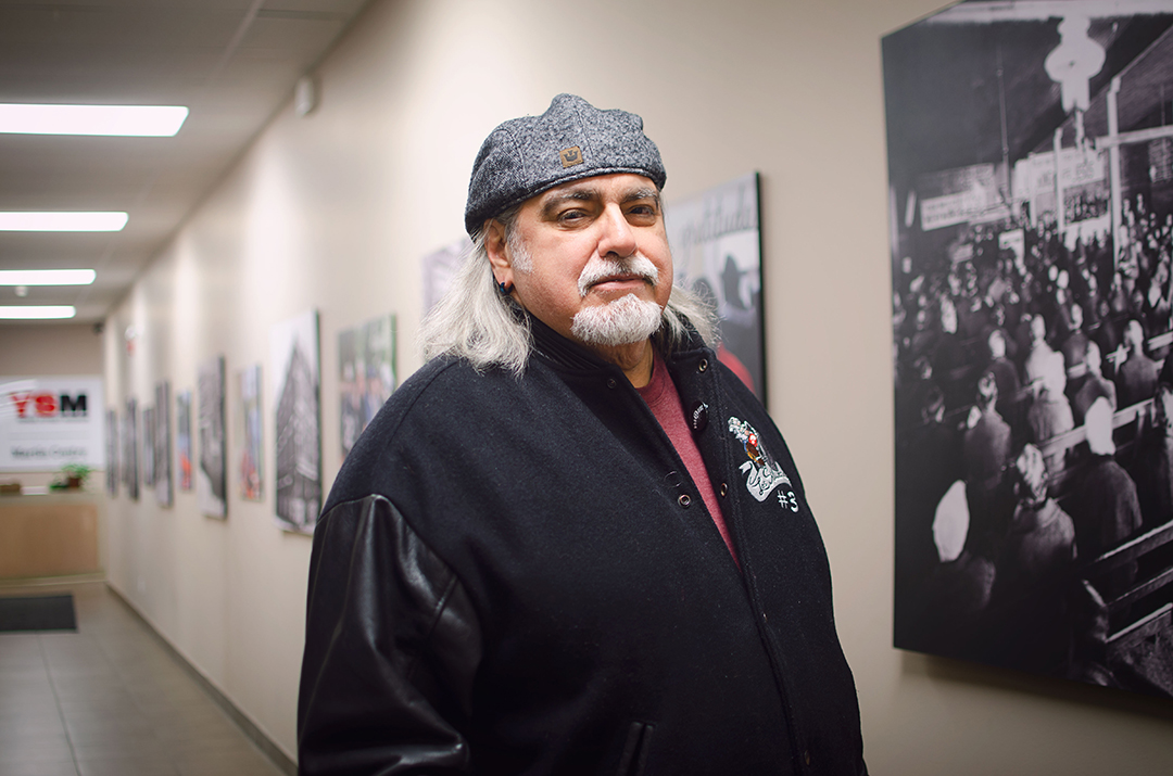 Rick Tobias stands in the hallway of YSM Martin Centre.
