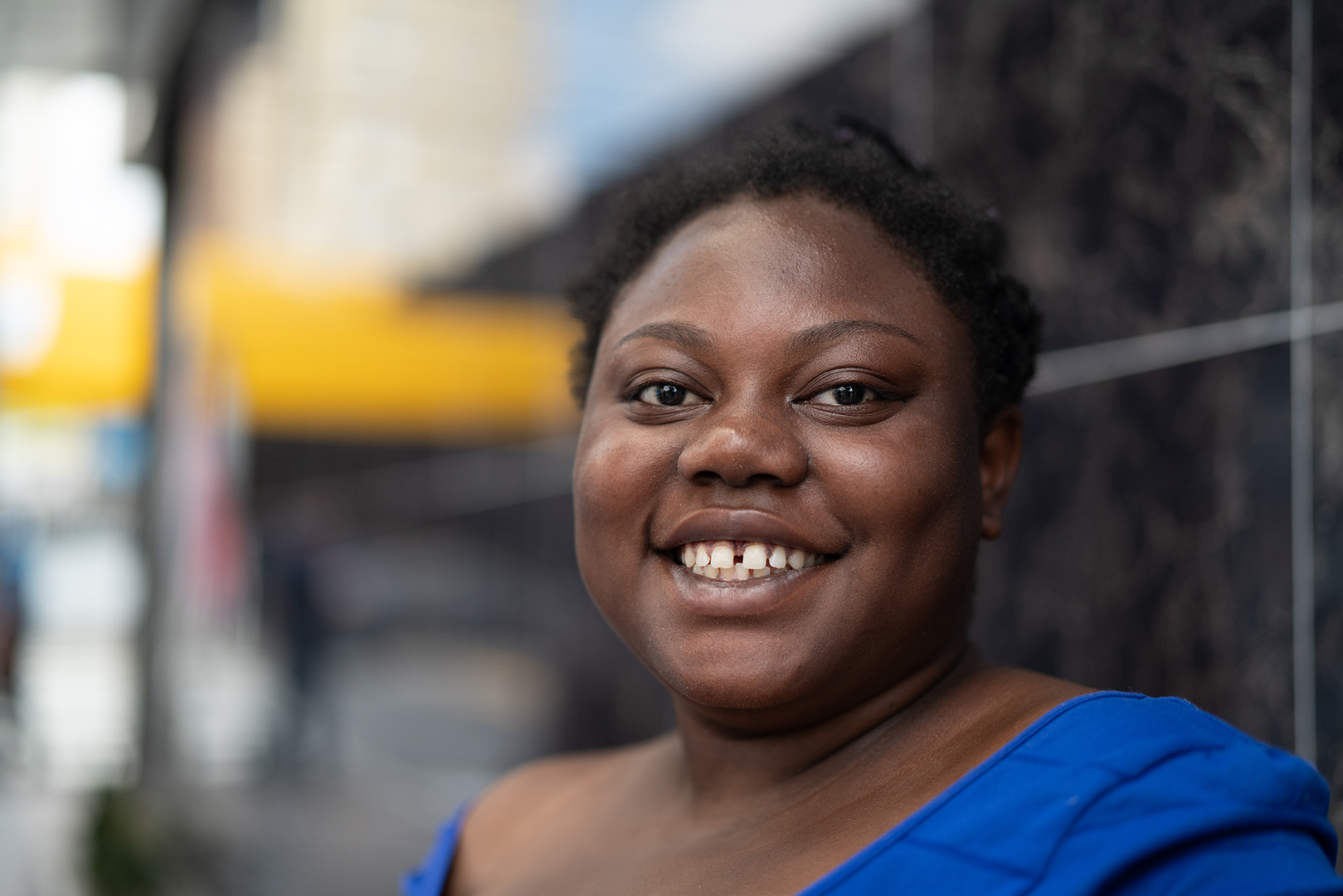 Black woman outside in city