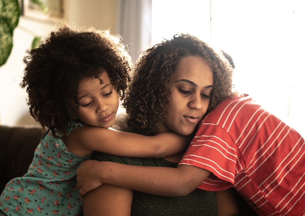 Mother trying to work with kids annoying her at home