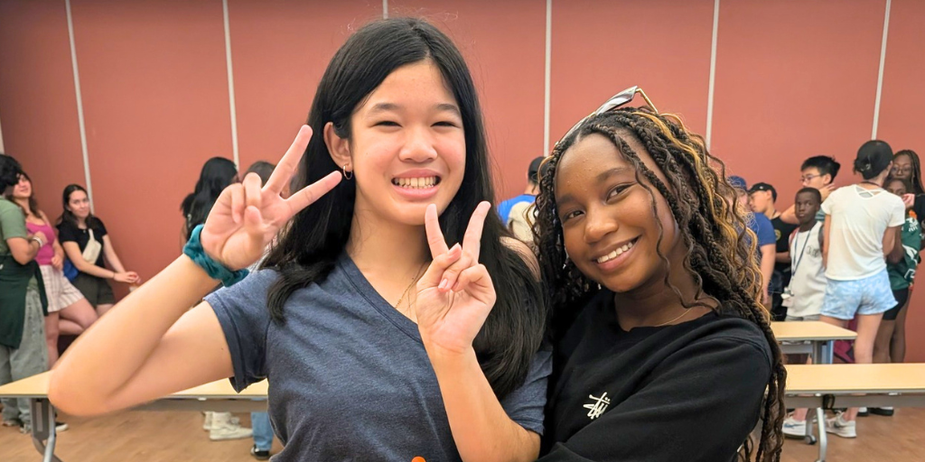 Two girls smiling