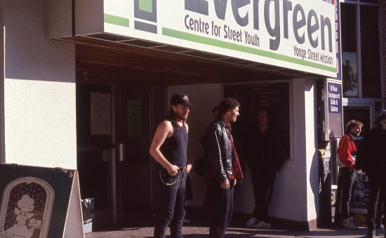 10 – 1979 two young men in front of building